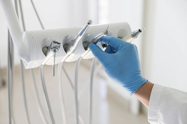 Professional Tooth Extraction technician working in Mogul, NV